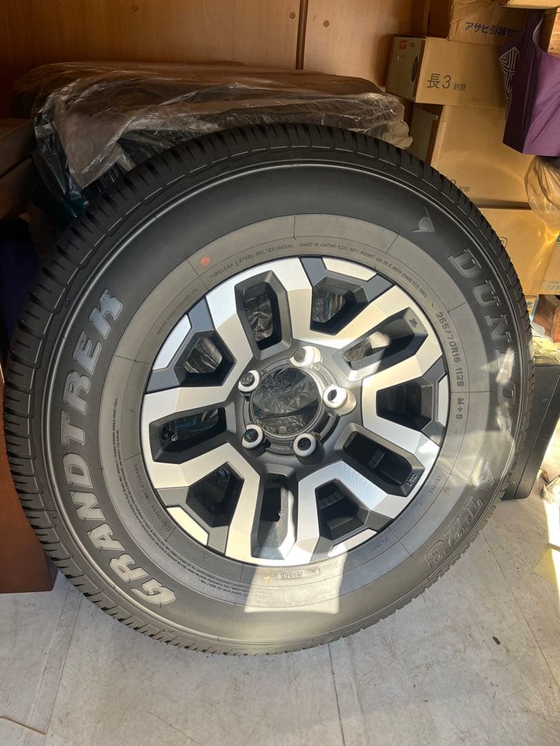 ダンロップGRANDTREK未使用品x4 ホイール付き（ランクル70純正品）