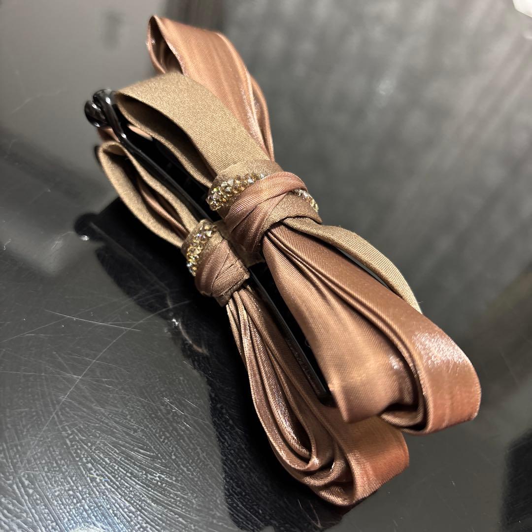 mie  Complex Biz シュカブラバナナクリップ　ブラウン