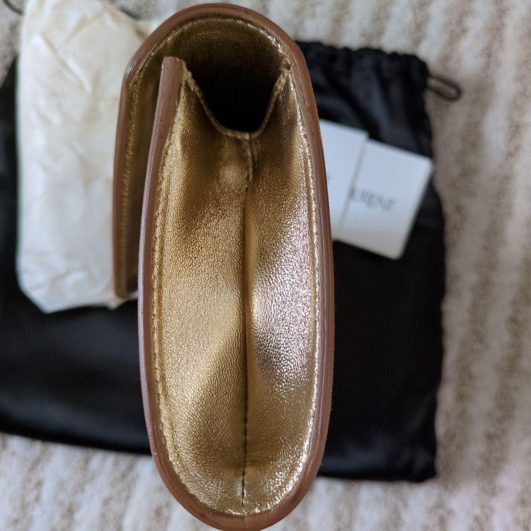 Yves Saint Laurent ゴールドクラッチバッグ
