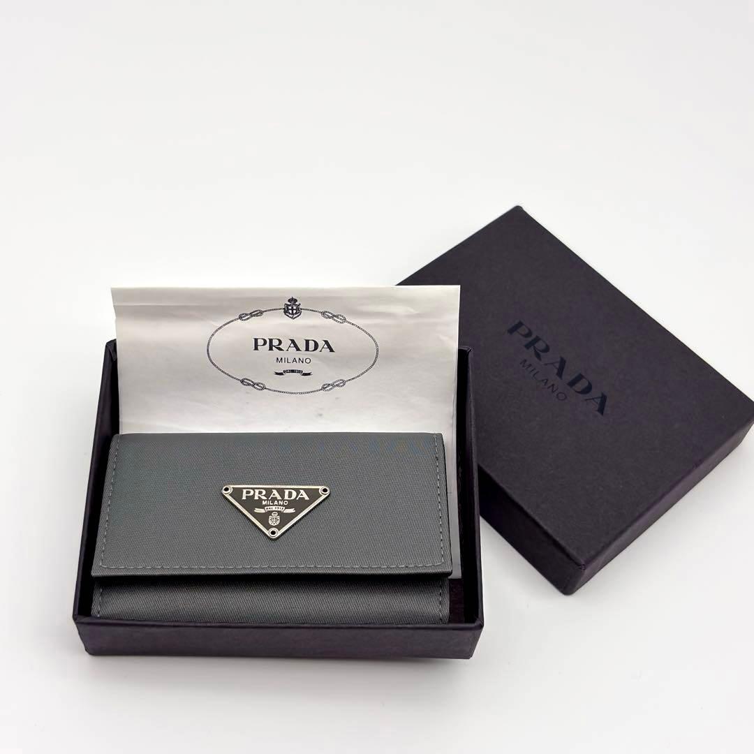 【箱付き未使用級】プラダ ６連 キーケース ナイロン×レザー 三角ロゴ グレー