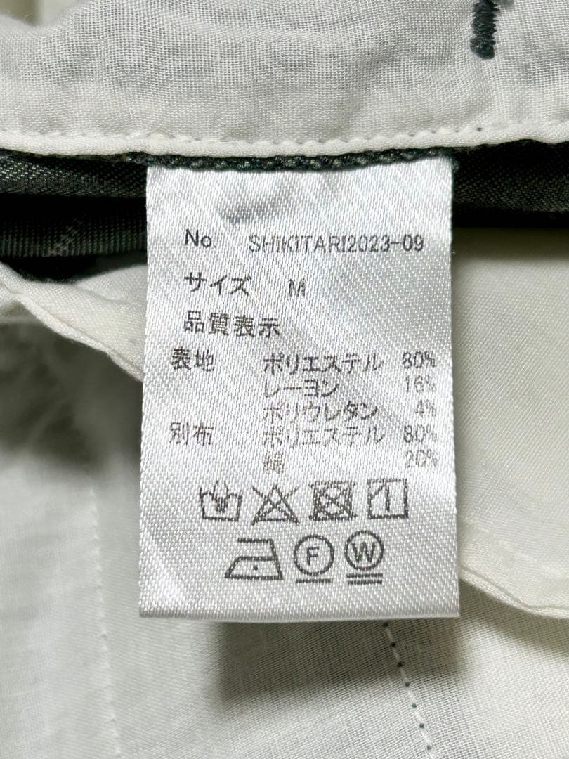 パンツ SHIKITARI STRIPE FLARE SLACKS GRAY