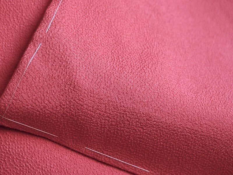 未使用 斎藤三才 縮緬の色無地（華やか桃赤系）裄68 背紋無 正絹美品