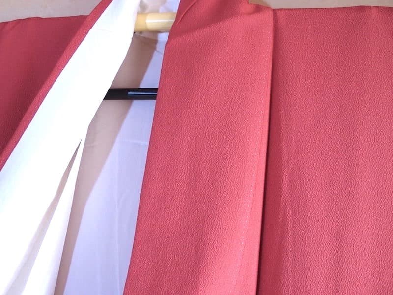 未使用 斎藤三才 縮緬の色無地（華やか桃赤系）裄68 背紋無 正絹美品