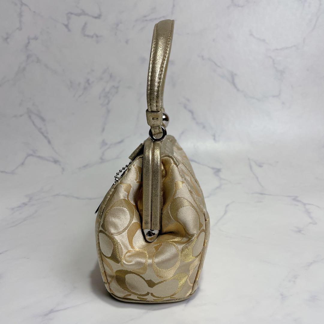 新品同様✨COACH アクセサリーポーチ がま口 シグネチャー イエローゴールド