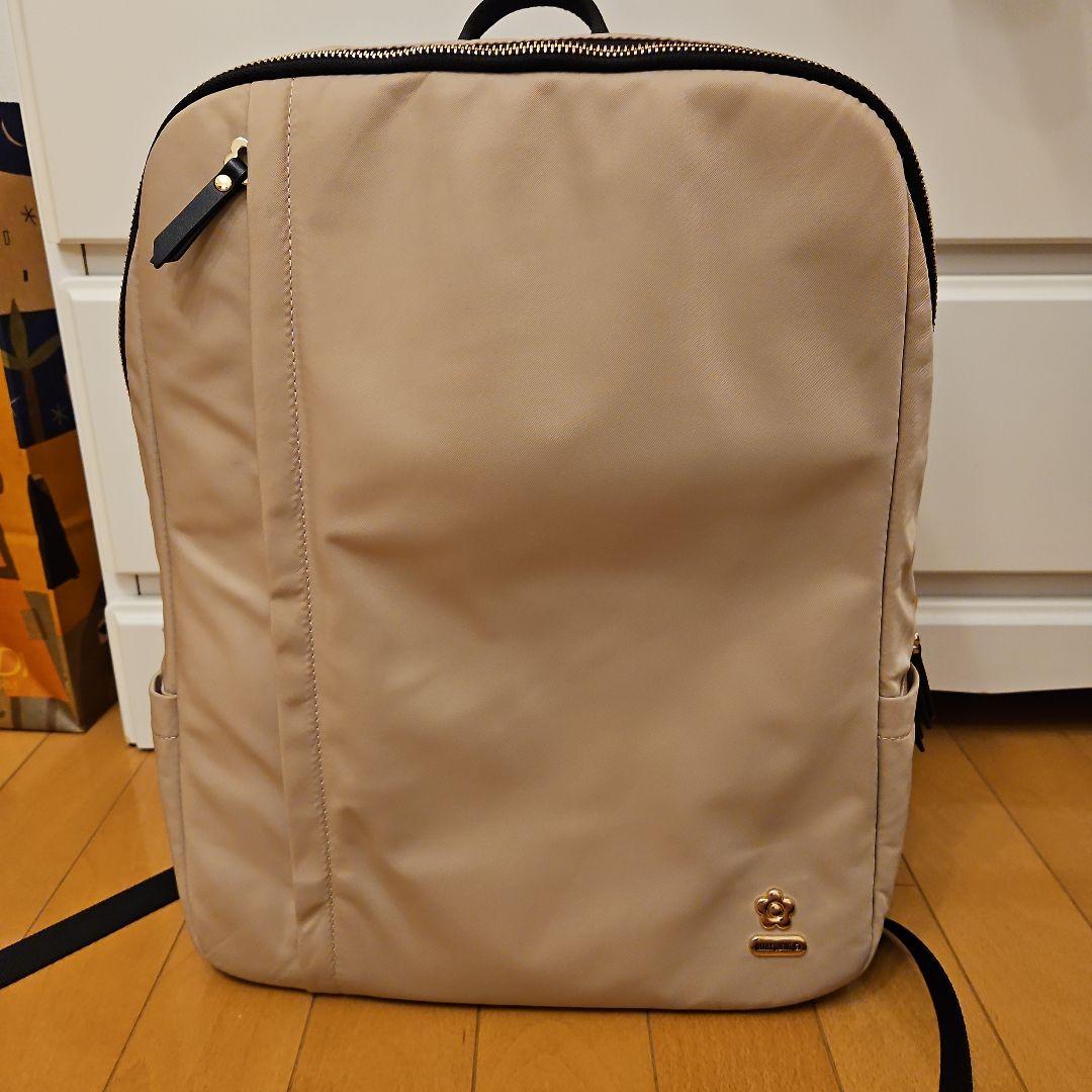 マリークヮントビジネスバッグ ベージュ 花のロゴ ゴールドジッパー