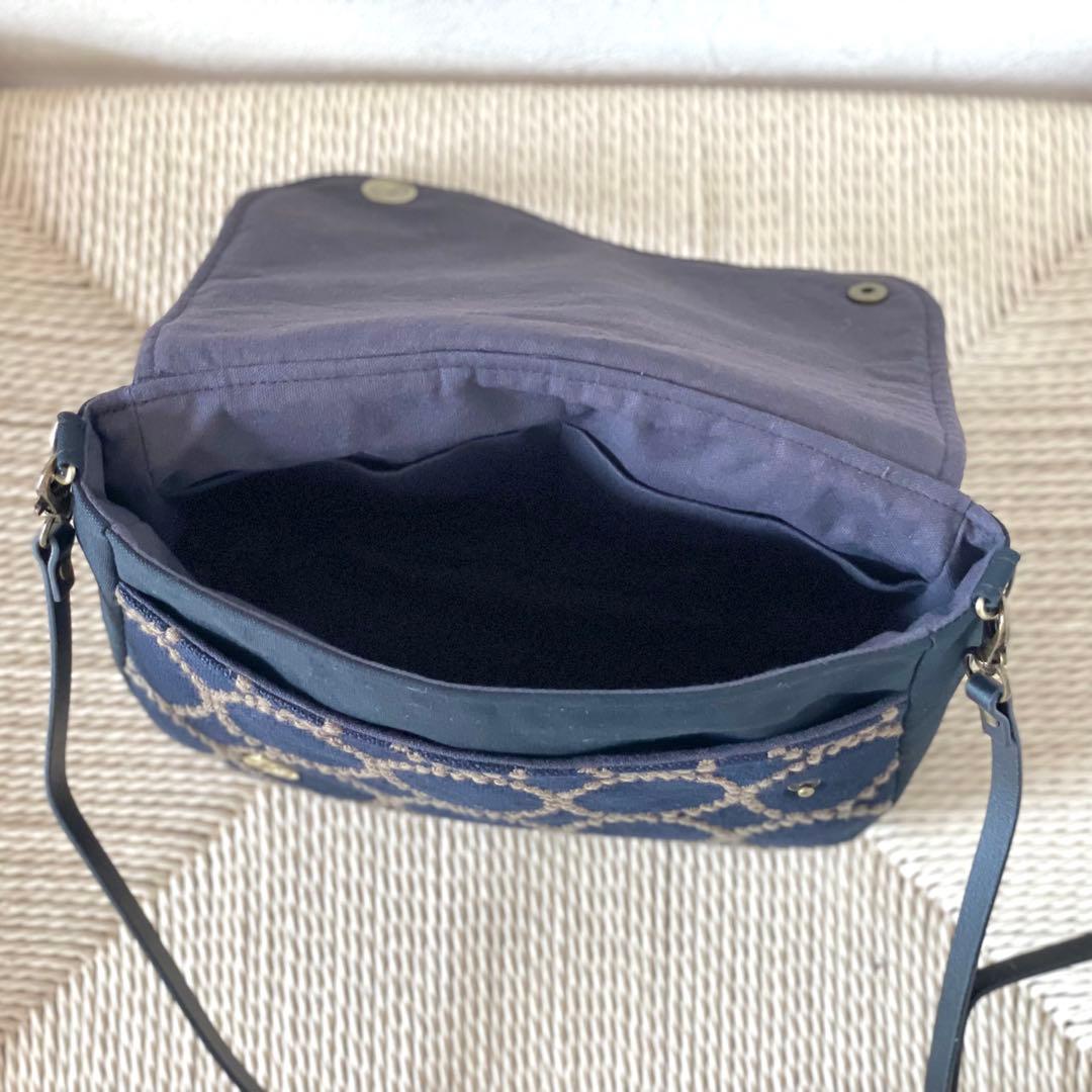 ⚮̈ミナペルホネン　tambourine いっぱいポッケのフラップポシェット