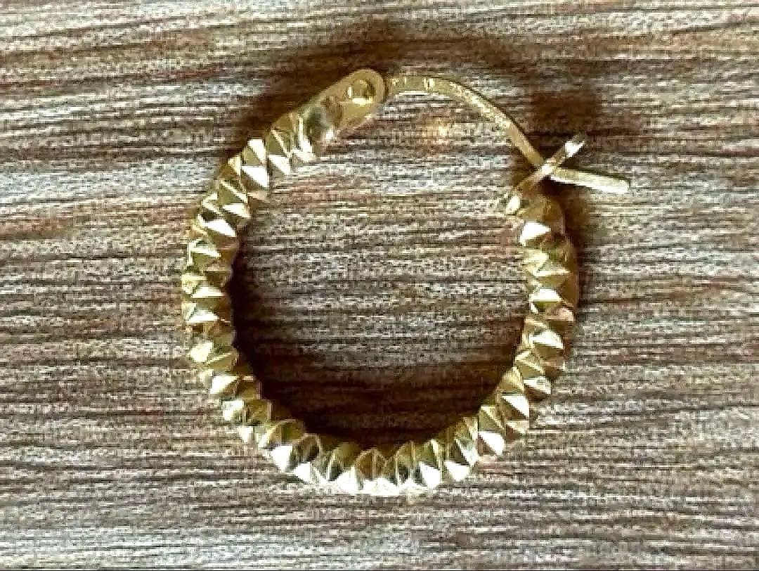 UNOAERRE スパイラルデザインピアス　片耳　18k