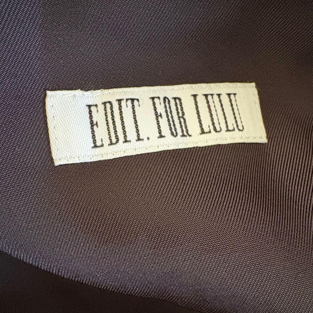 ウエストドローストリング付き黒ジャケット