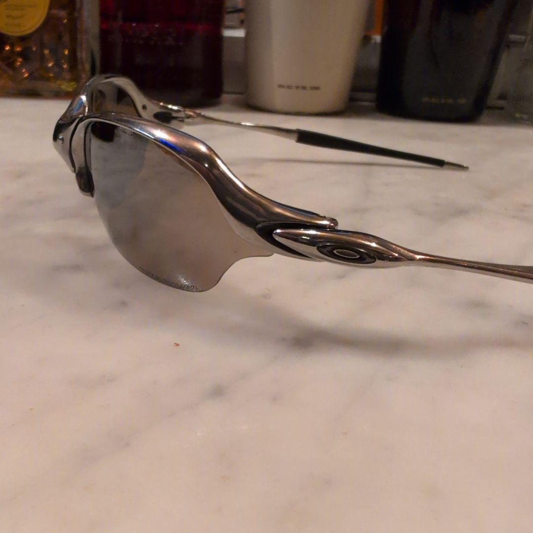 Oakley サングラス ブラウンレンズ シルバーフレームチタンカラーレンズ