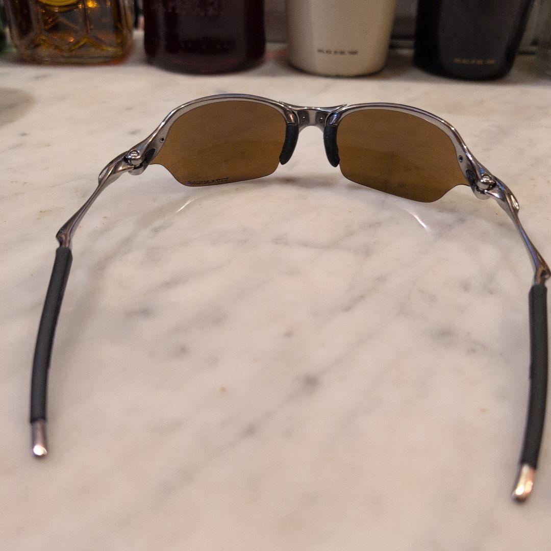 Oakley サングラス ブラウンレンズ シルバーフレームチタンカラーレンズ