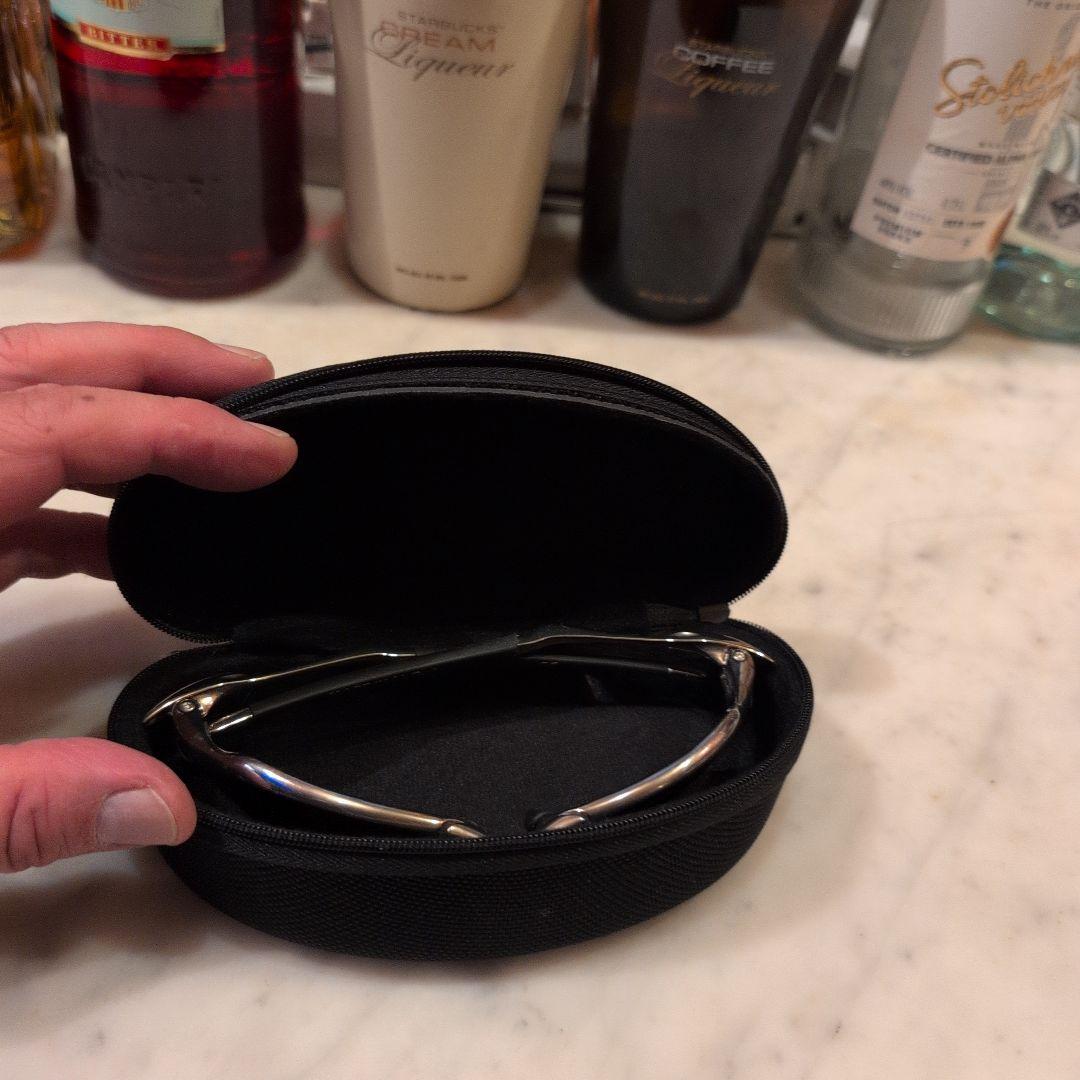 Oakley サングラス ブラウンレンズ シルバーフレームチタンカラーレンズ