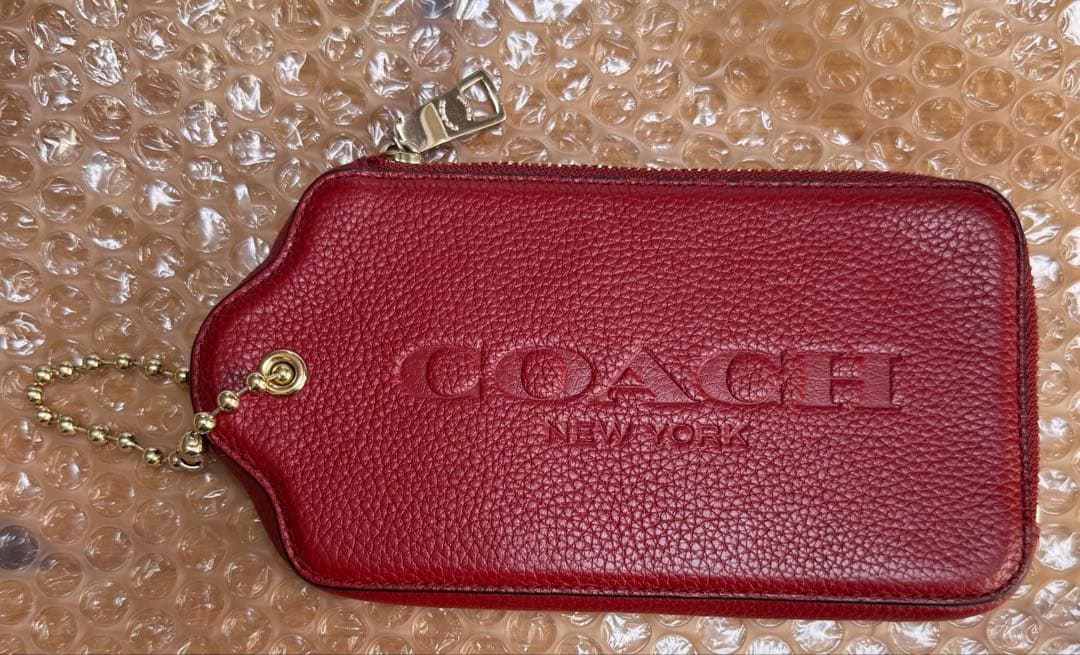 COACH マルチファンクションケース ビッグハングタグバッグチャーム　ポーチ