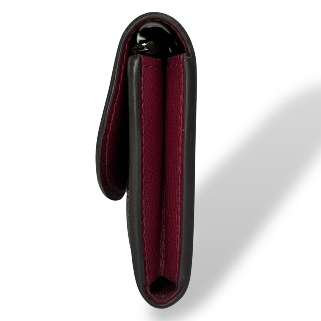 ルイヴィトン　ケース　ポルトモネロザリ　フューシャ　モノグラム　ブラウン