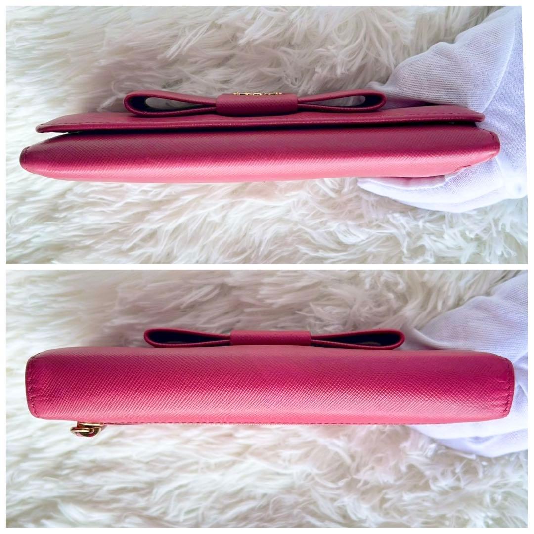 美品✨プラダ 長財布 サフィアーノ フィオッコ ピンク メタルロゴ リボン
