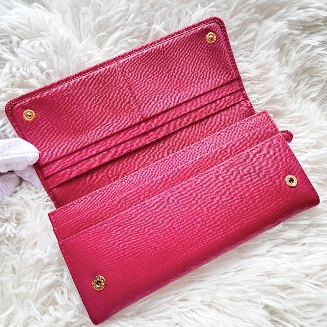 美品✨プラダ 長財布 サフィアーノ フィオッコ ピンク メタルロゴ リボン