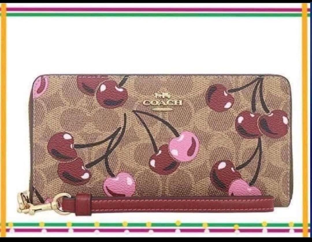 COACHコーチシグネチャーチェリープリントロングzip長財布