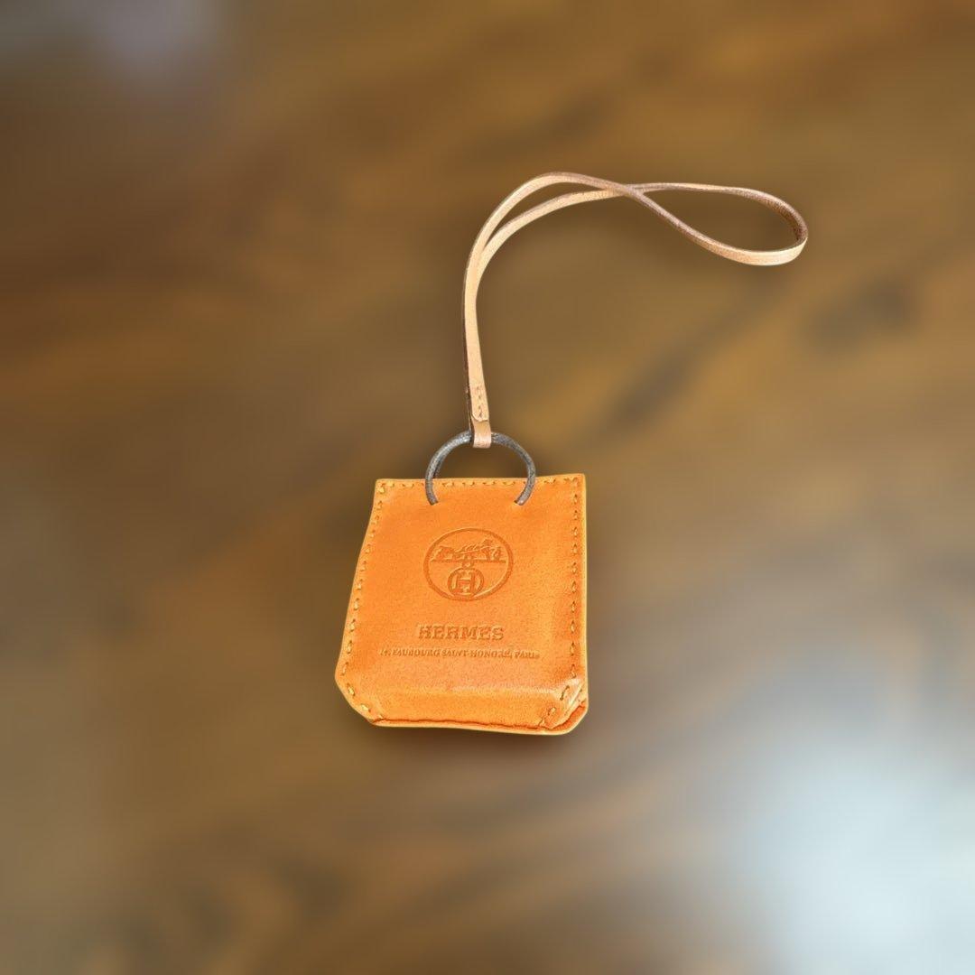 ラ*】様 HERMES レザー チャーム オレンジ