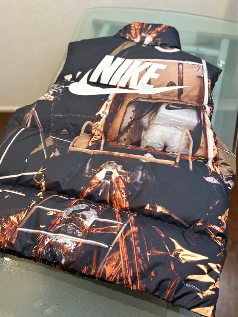 最終価格NIKE グラフィックプリント ダウンベスト Lサイズ