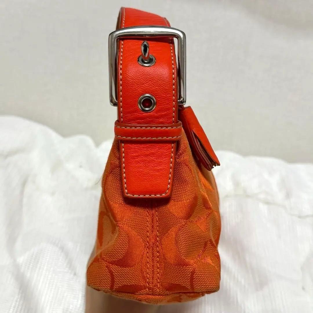 COACH アクセサリーポーチ　ワンショルダー　シグネチャー　オレンジ