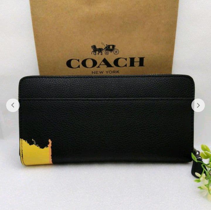 新品未使用コーチ長財布パスキアコラボブラックオレンジレディースメンズ送料無料