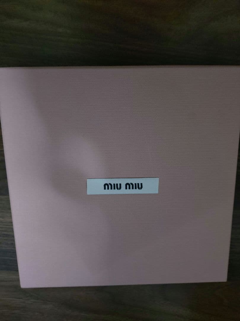 miu miu 星形チャーム 黒