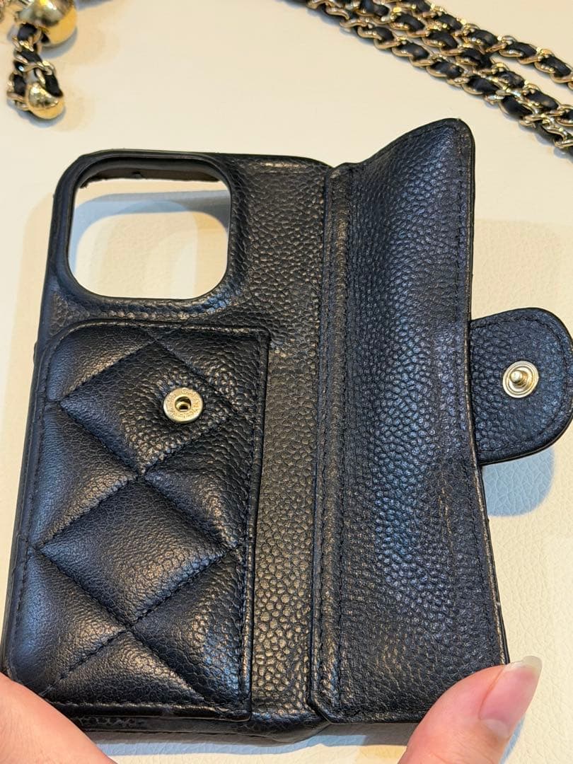 CHANEL iPhone14Proスマホケースキャビアスキンマトラッセチェーン