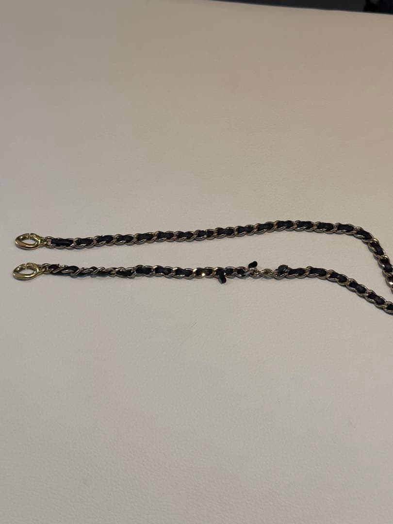 CHANEL iPhone14Proスマホケースキャビアスキンマトラッセチェーン