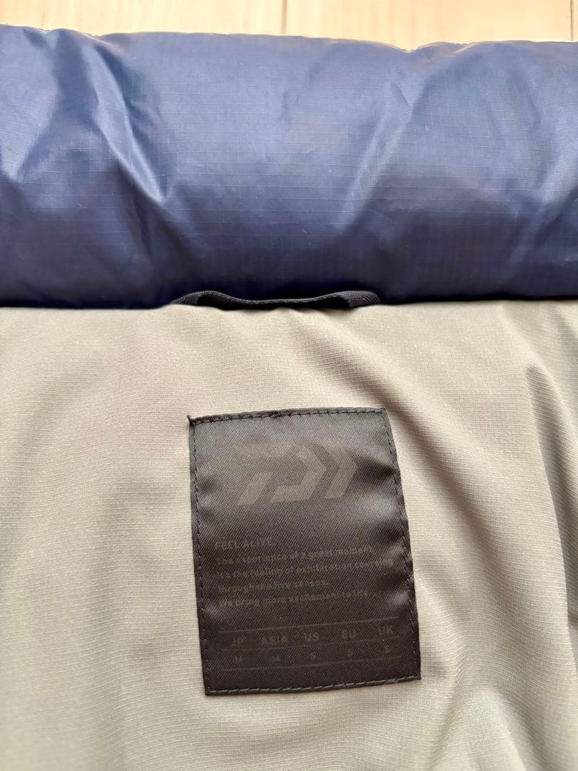 DAIWA PIER39 M TECH BACK PACKER ダウンベスト
