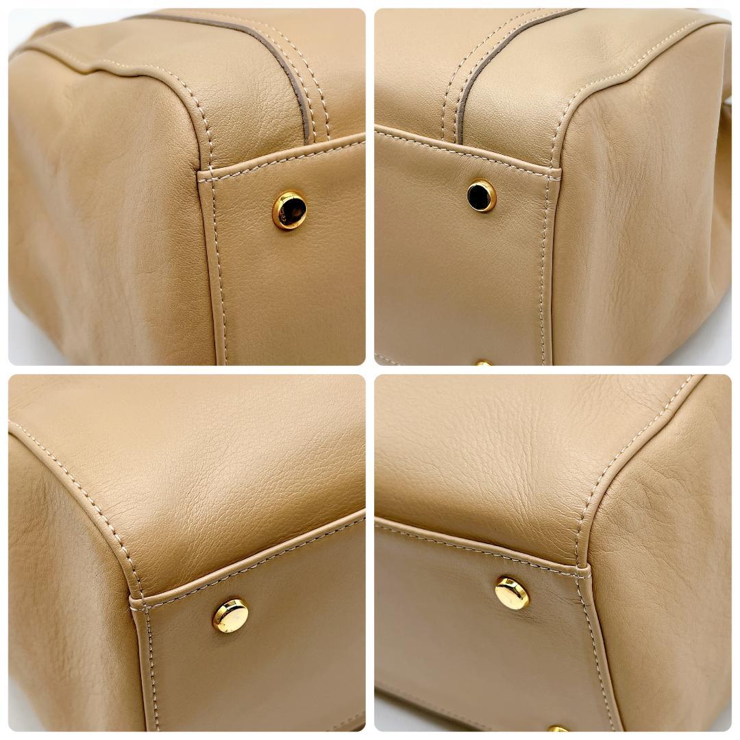 極美品WAKO ゴールドハンドル ハンドバッグ タッセル レザー f557