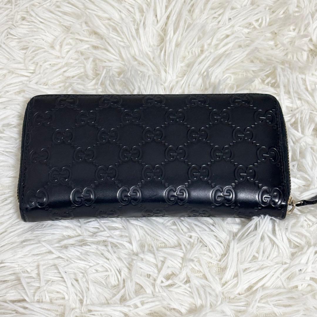 グッチ 財布 ラウンドファスナー GG シマ リボン インターロッキング　黒
