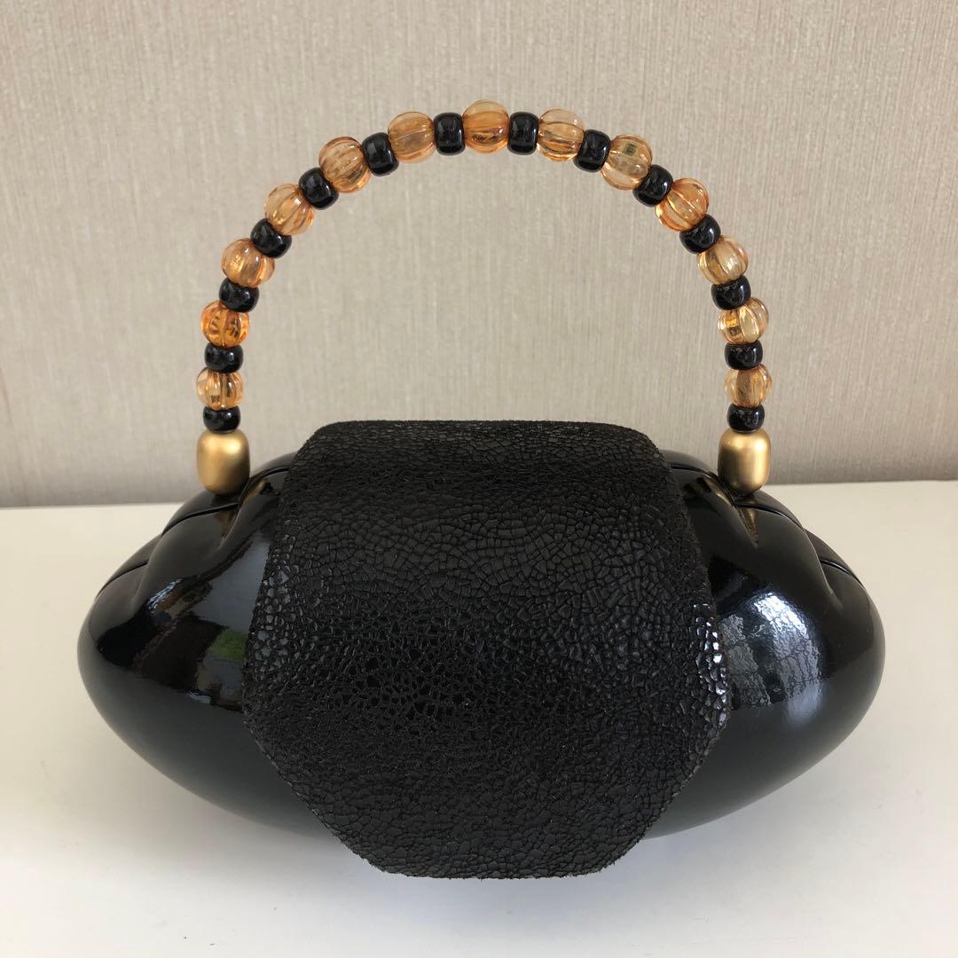 【新品未使用】〈ティミー・ウッズ〉ビーズハンドル付き・黒い木のバッグ