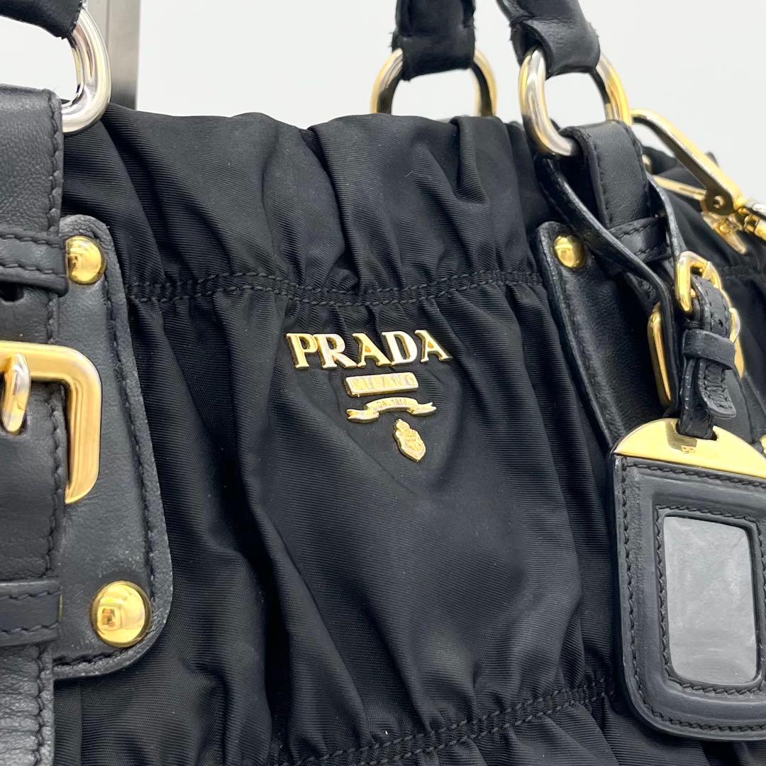 PRADAプラダ ボンバー ギャザー メタルロゴ G金具 2WAYハンドバッグ黒