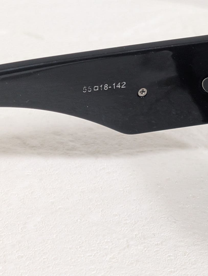 PRADA トライアングル ロゴ サングラス