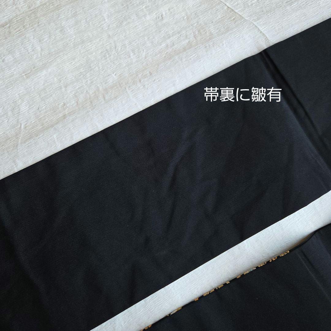 帯屋捨松　細かな煌めきを締める　草花模様の名古屋帯