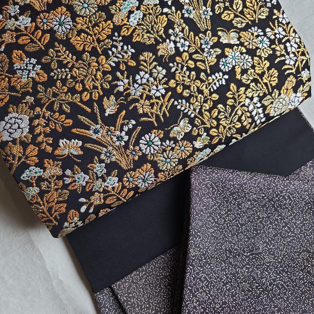 帯屋捨松　細かな煌めきを締める　草花模様の名古屋帯