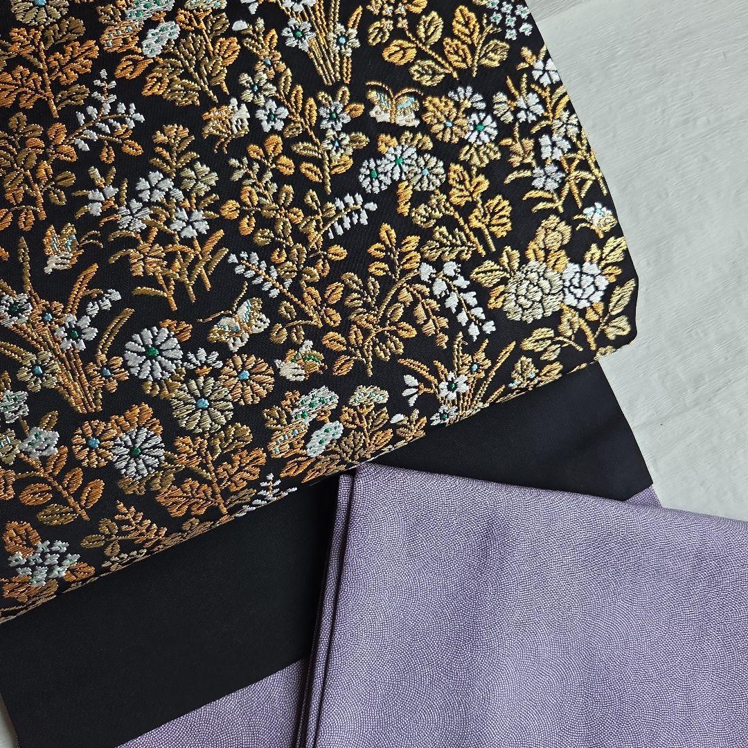 帯屋捨松　細かな煌めきを締める　草花模様の名古屋帯