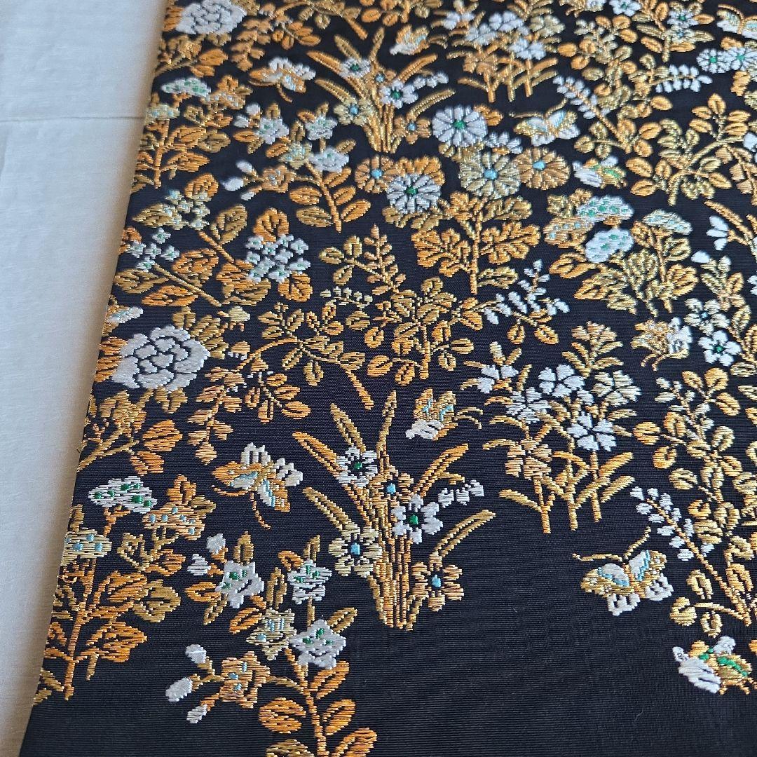 帯屋捨松　細かな煌めきを締める　草花模様の名古屋帯