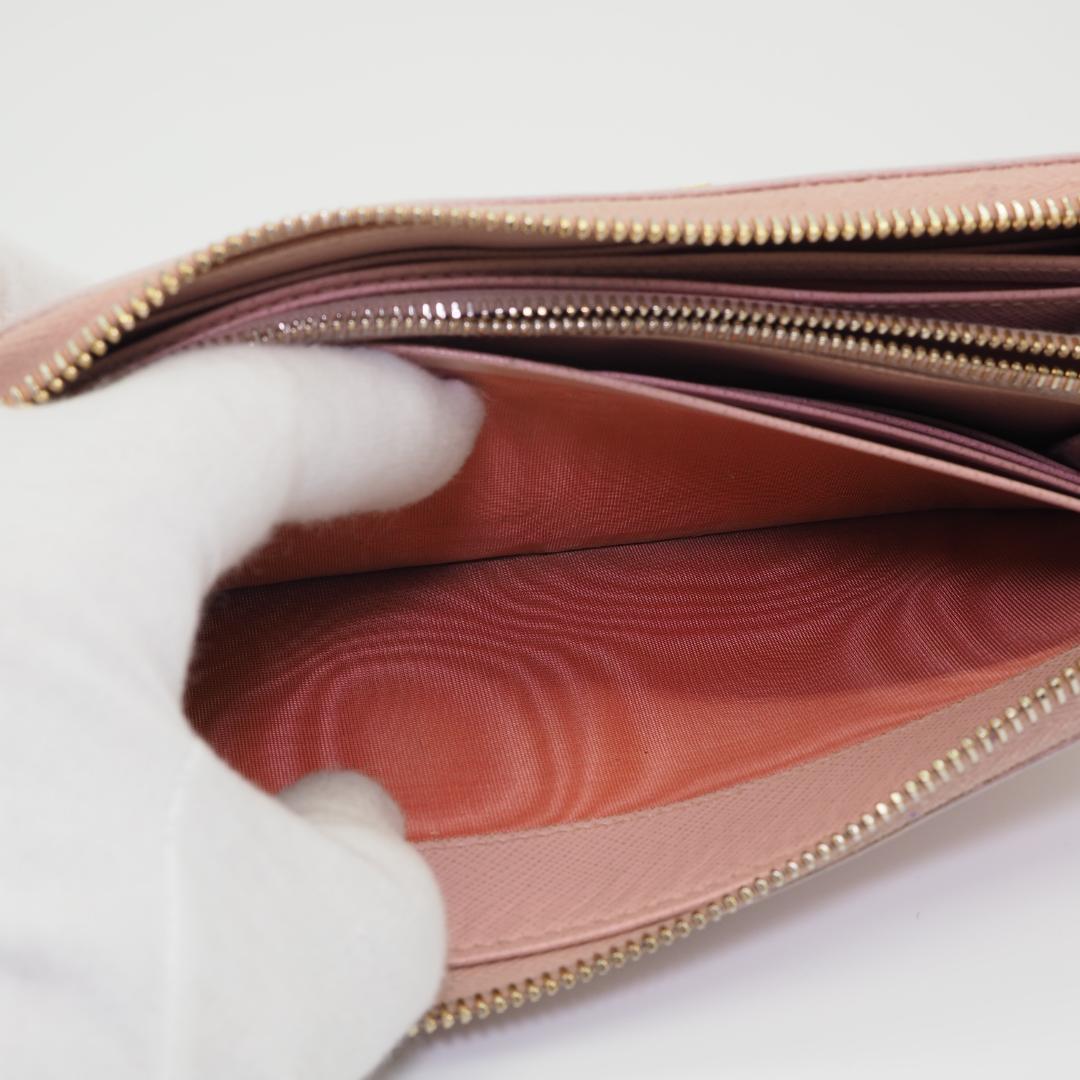 PRADA プラダ サフィアーノ ラウンドファスナー ピンク系 ゴールドロゴ