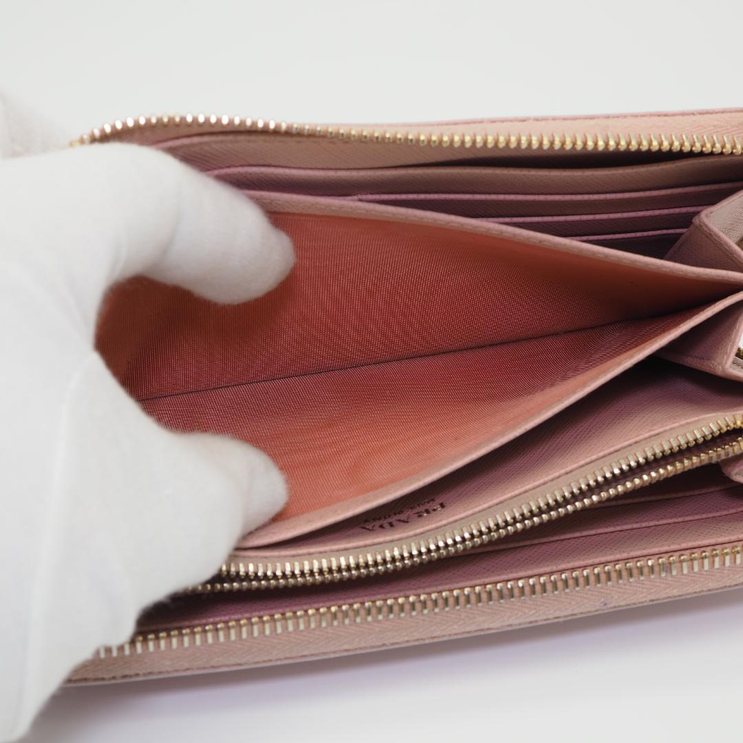 PRADA プラダ サフィアーノ ラウンドファスナー ピンク系 ゴールドロゴ