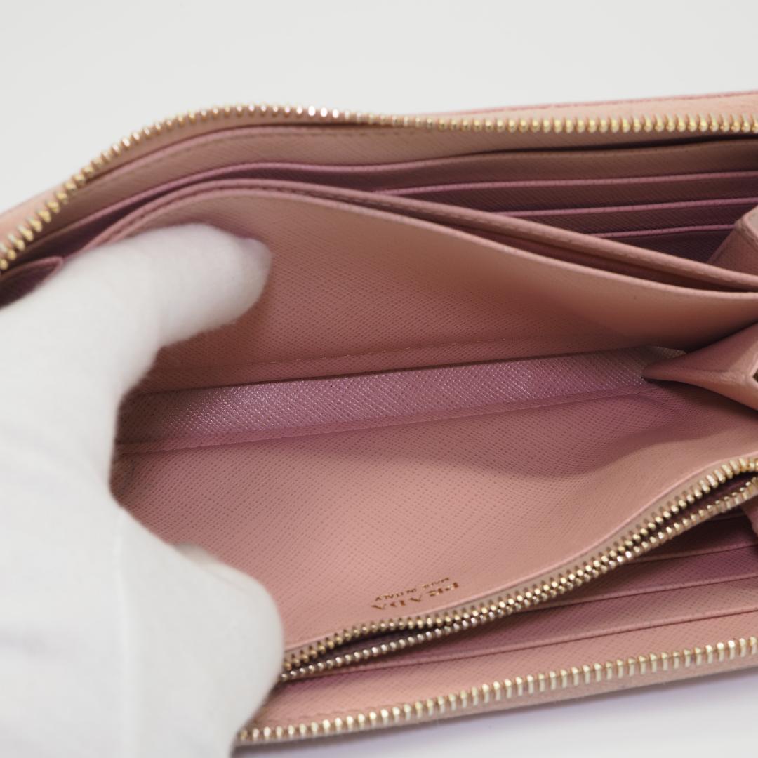 PRADA プラダ サフィアーノ ラウンドファスナー ピンク系 ゴールドロゴ