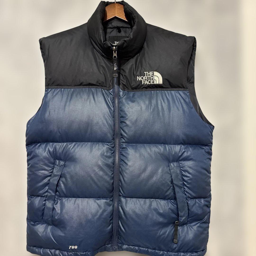 ノースフェイスヌプシダウンベスト700フィル刺繍口ゴドローコード