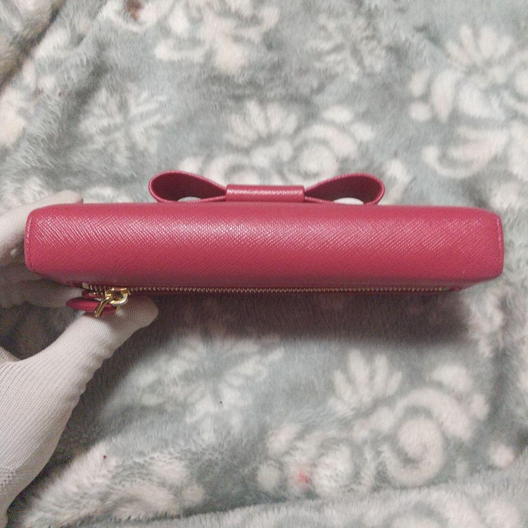 PRADAサフィアーノ レザーリボン付き 長財布 レッド系