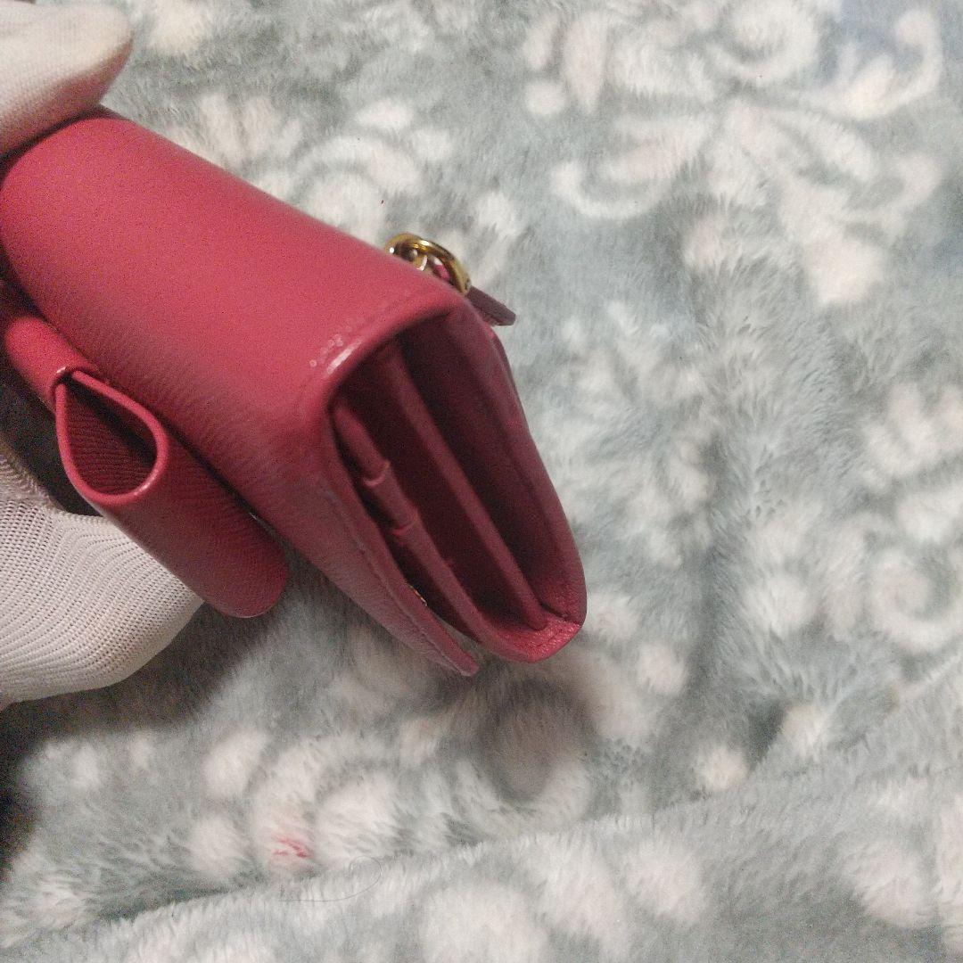 PRADAサフィアーノ レザーリボン付き 長財布 レッド系