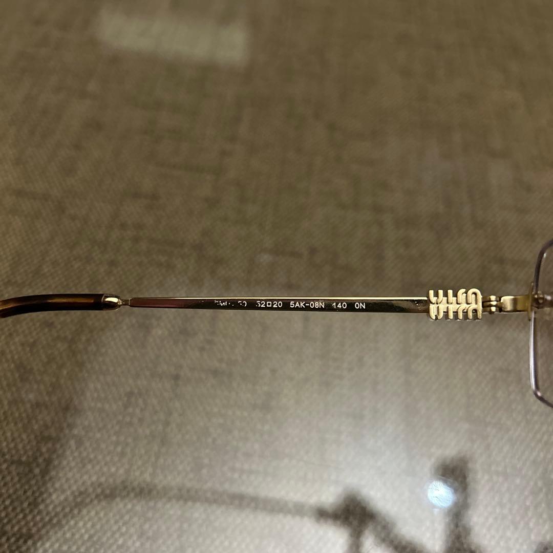 MIU MIU リムレス　リムレスメガネ　サングラス　ゴールド　ミュウミュウ