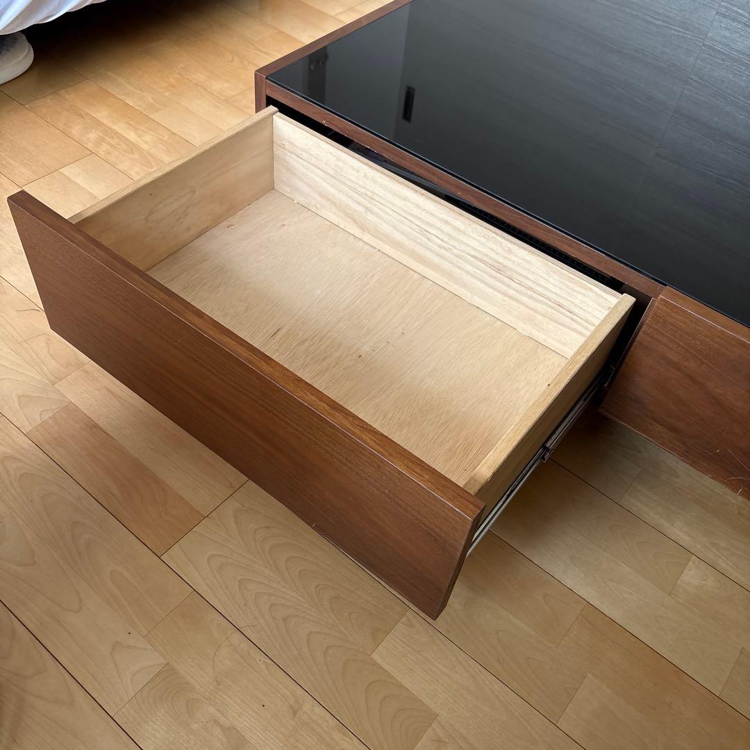 底値！LOWYAのダークブラウンガラス天板 ローテーブル中古48000円の品