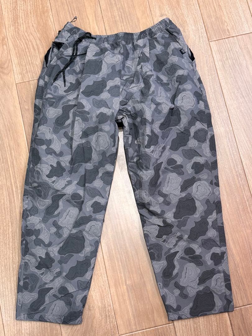 ネルデザインワークス　ナイロンパンツ　トポカモグレー