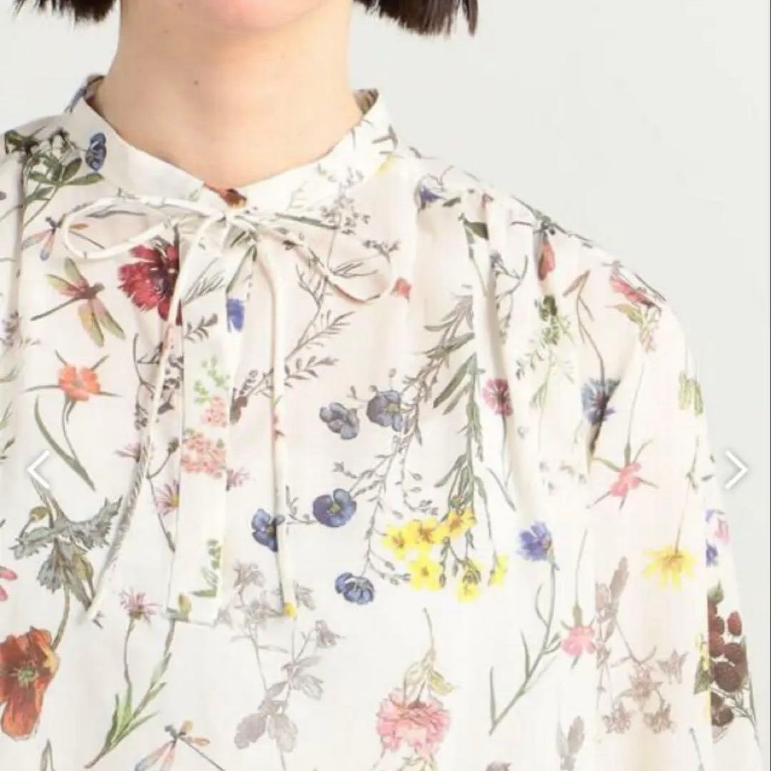 ボタニカルリベルラプリント ボウタイブラウス　トゥモローランド