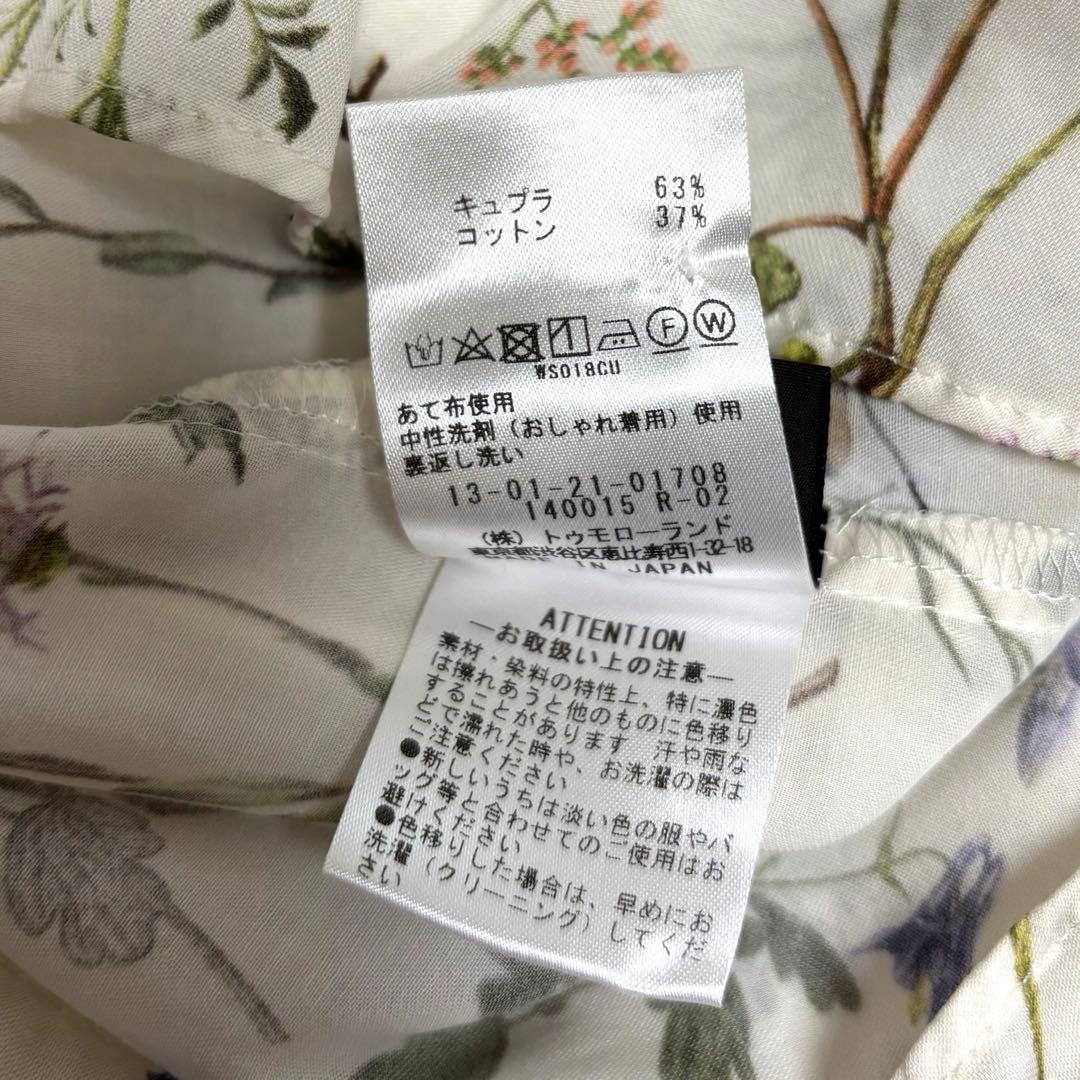 ボタニカルリベルラプリント ボウタイブラウス　トゥモローランド