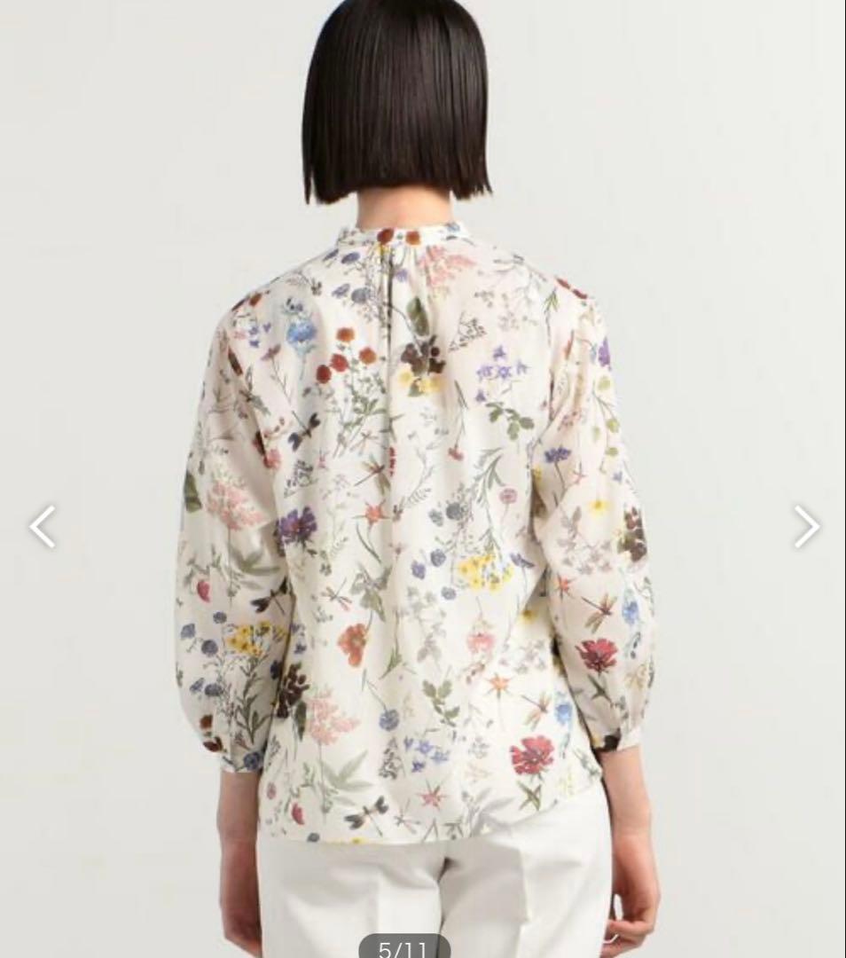 ボタニカルリベルラプリント ボウタイブラウス　トゥモローランド