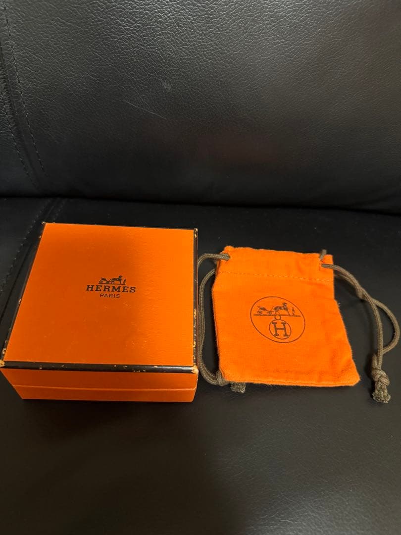 HERMÈS（エルメス）のオレンジバングル